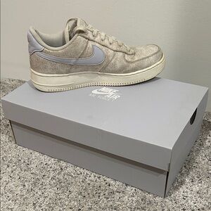 Nike Beige Sneakers with Gray Swoosh